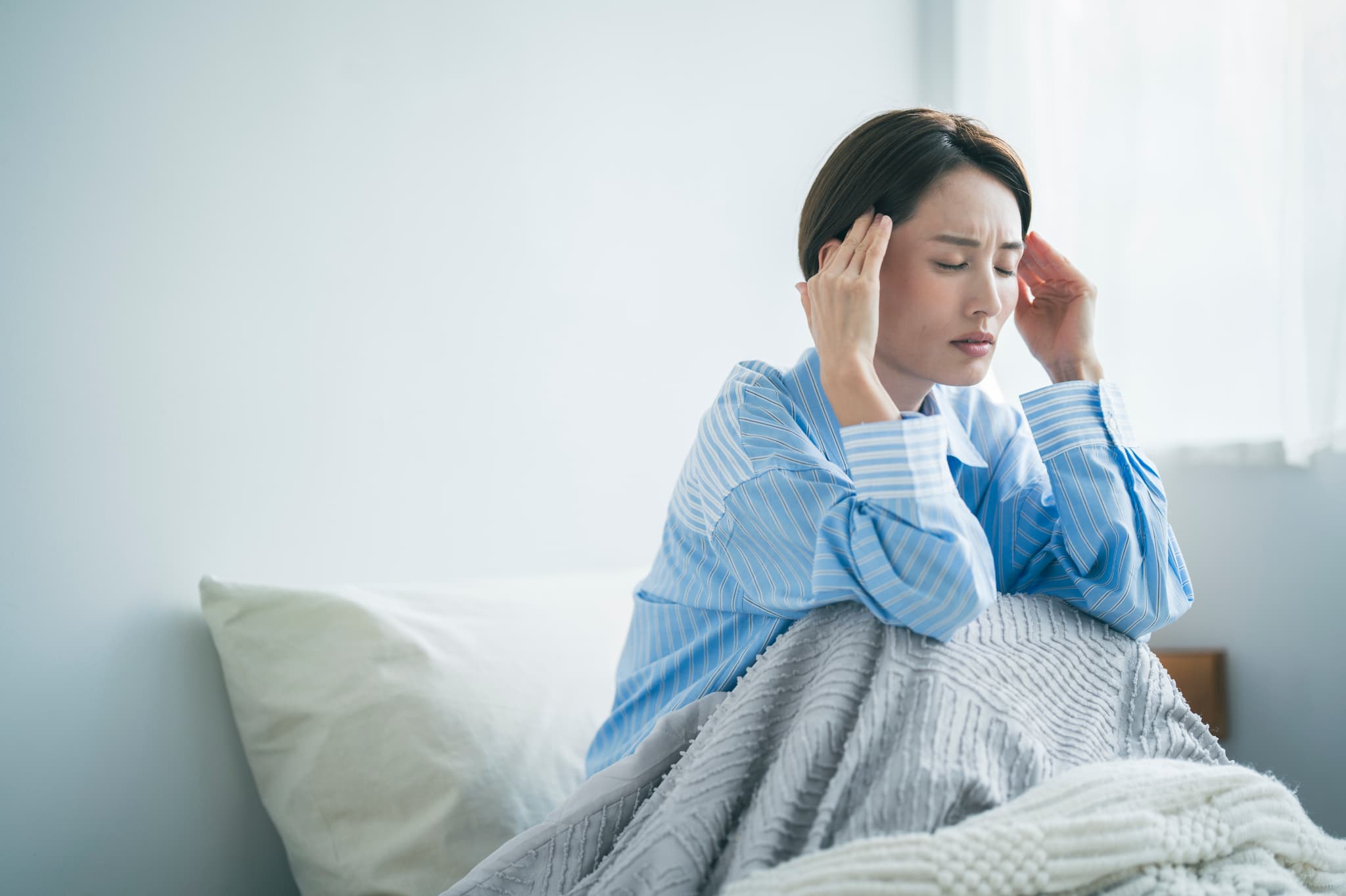自律神経が乱れ不調を感じる女性