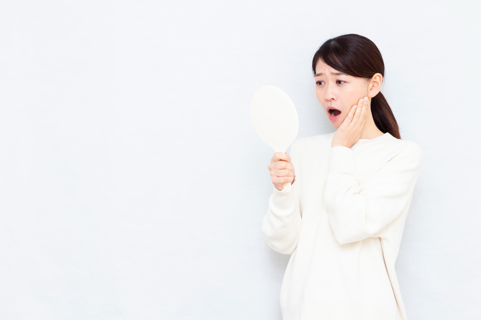 お口のトラブルが起きた女性