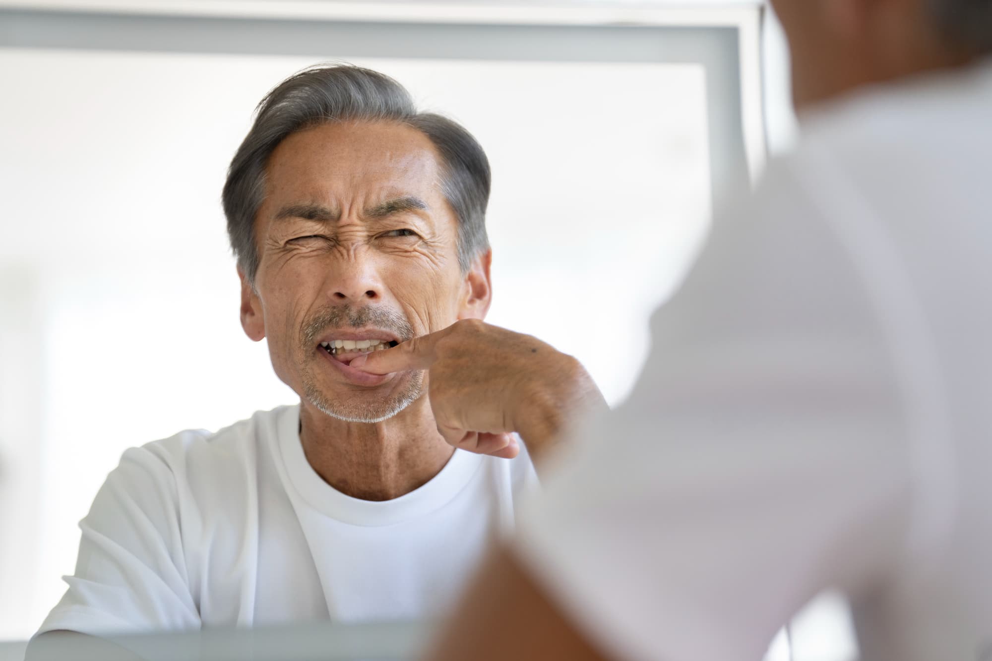 歯周病になったミドル男性
