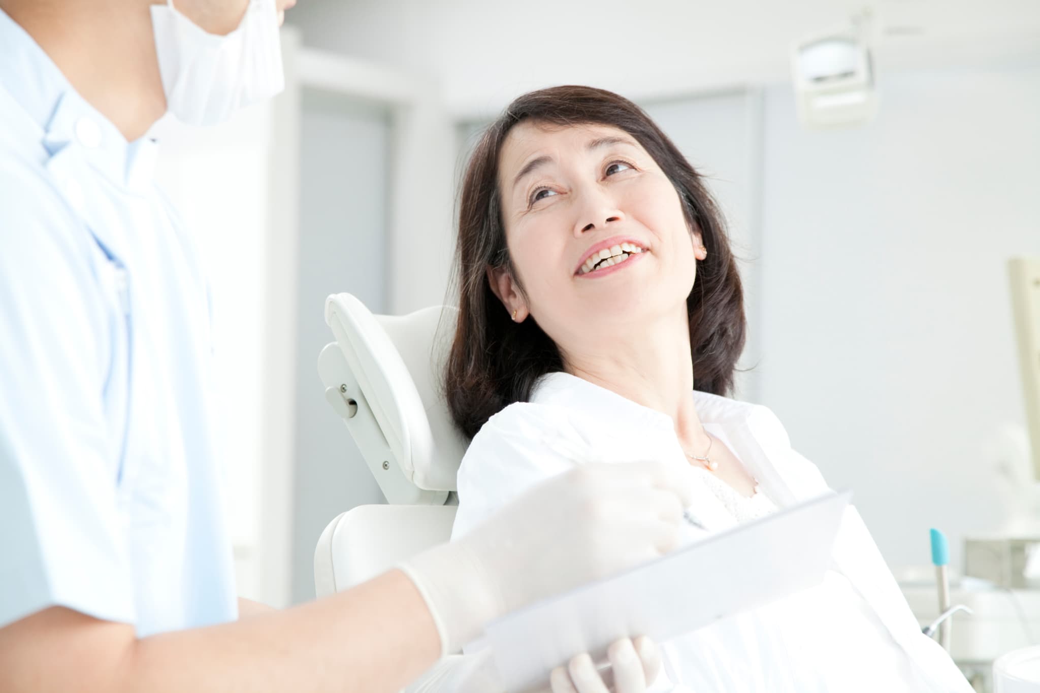 歯科医院へ相談に訪れた女性