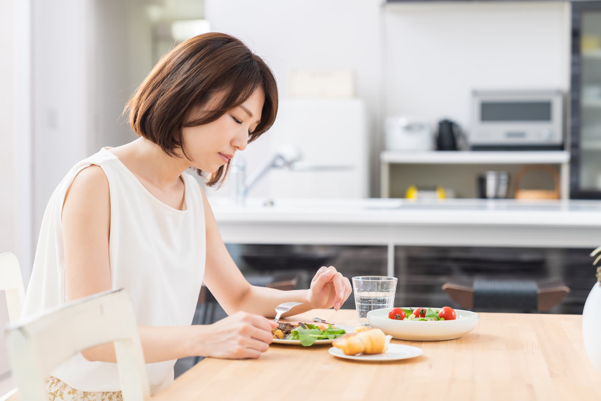 噛めないことで食事がストレスになった女性